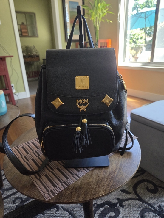 MCM Handbags - MCM Black Leather Mini Backpack with Gold Hardware